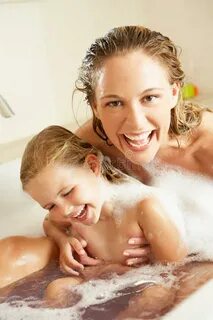 Mother Daughter Relaxing Bubble Filled Bath Photos - Free & 