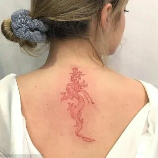 Red dragon tattoo on the upper back. Red dragon tattoo, Red 