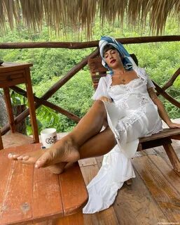 Jackie Cruz Shows Her Sexy Legs and Tits in a White Dress (5 Photos) .