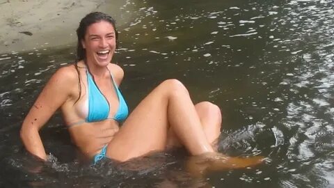 Bikini Clad Woman Swings Into Shallow Water Jukin Licensing