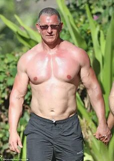 Chef Robert Irvine, 49, displays ripped chest on romantic st