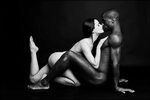 Interracial Semi Nude Female Couple On Faux Fur Blanket - He