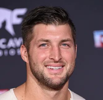 GOOD VIBES: Tim Tebow Gives Shoes Off Of His Feet To Homeles