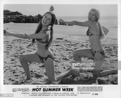 Dianne Hull and Kathleen Cody in bikinis and on the beach in