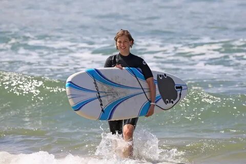 ROSAMUND PIKE in Bikini Paddle Boarding in Hawaii - HawtCele