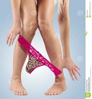 Legs pulling panties down. stock image. Image of passion - 4