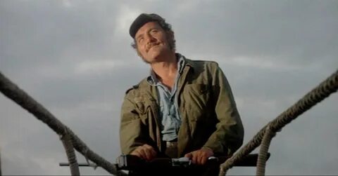 JAWS / Quint: "Here's to swimmin' with bow-legged women." Ja