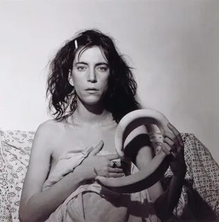 On January 23, 1977, Patti Smith injured her spine by fallin