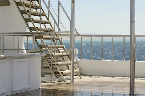 Boat Ladder, Deck on the Stern of the Yacht on a Sunny Day a