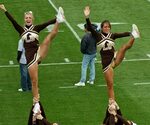 Cheerleader Co-captains with acrobatic move Lehigh Univers. 