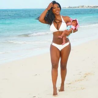 Kenya Moore, 48, stuns in bikini with 2-month-old daughter V