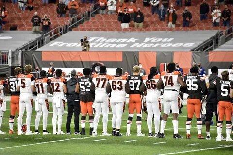 Cleveland Browns and Cincinnati Bengals Stand, Link Arms Tog
