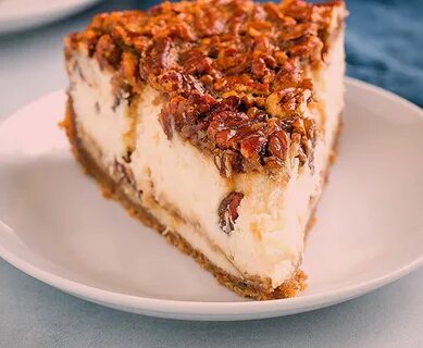 Pecan Pie Cheesecake with real pecan pie filling on top of a