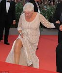 Dame Judi Dench wows at Venice Film Festival in elegant ivor