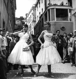 Two models in dresses designed by Jole Veneziani, 1956 Modes