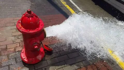 fire hydrant gushing clean water flow Stock Footage Video (1