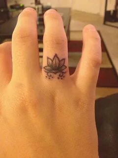 Lotus finger tattoo(: Flower finger tattoos, Small lotus flo