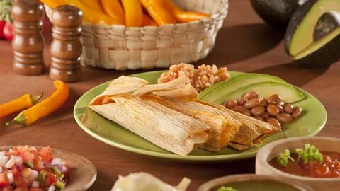 Receta de tamales rellenos de salsa verde y carne de cerdo