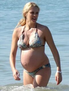 Teresa Palmer looks just swell as she frolics in a bikini on