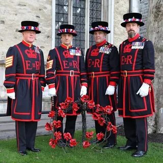 Yeoman Warders with some of the ceramic poppies made into a 