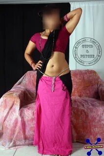 Rati - Desi housewife posing in a purple saree and blouse.