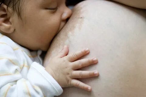 9 Tips for Breastfeeding With Large Breasts.