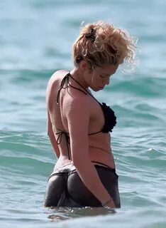 Shakira wearing two bikini sets at the beach while on vacati