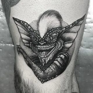 Gremlins tattoo black work by. @fjfernandez on IG Gizmo tatt