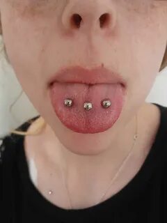 venoms triple tongue piercing by brett at talisman tattoo ar