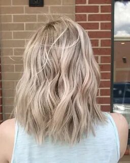 wind blown rooty champagne blonde balayage Champagne hair co