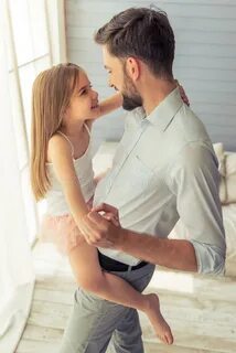 Father and daughter stock image. Image of handsome, couch - 