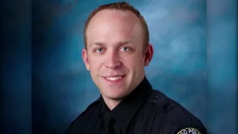 Officer's family says goodbye after deadly standoff in North