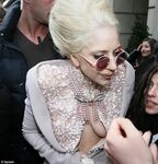 Lady Gaga masks fury at cancelled Parisian show by getting d