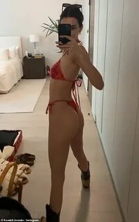 Kendall Jenner puts on a cheeky display in a red bikini... a