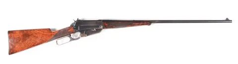 A) Deluxe Winchester Model 1895 Lever Action Rifle