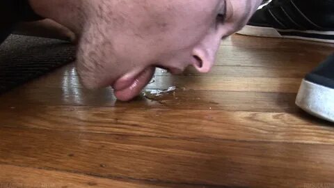 Man eating cum off floor