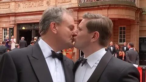 Downton Abbey stars Hugh Bonneville and Allen Leech kiss on 