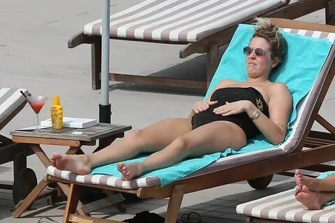 LYDIA BRIGHT in Swimsuit at a Pool in Ibiza 09/20/2019.