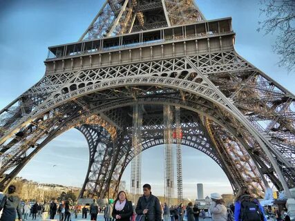 Strolling Beneath the Iconic Eiffel Tower Paris, France