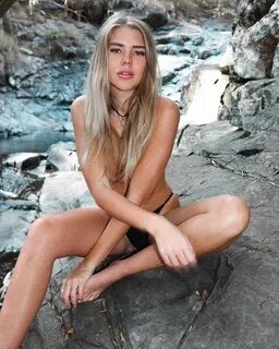Jade Grobler Lays On The Beach In A Mismatched Bikini - The 