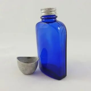 Cobalt Blue Glass Bottle with Metal Eye Wash Cup Ribbed Side