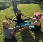Kelly Ripa's acroyoga workout moves Well+Good