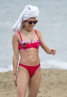 ASHLEY ROBERTS in Bikini at a Beach in Ibiza 08/12/2019 - Ha