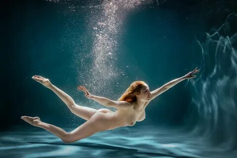 Nude underwater swimming