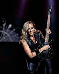 Nita Strauss Sends Stunning Pose To Call Fans Alice Cooper's