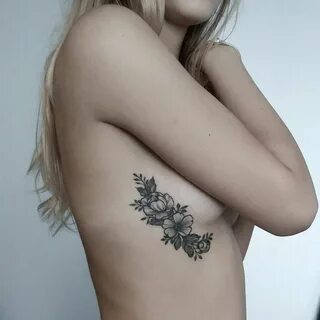 Underboob side boob tattoo