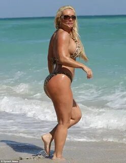 Ice-T's wife Coco unleashes her massive curves in tiny anima