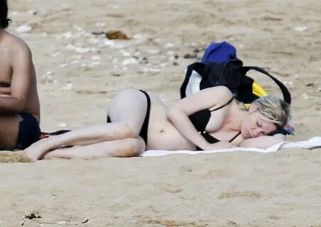 Kirsten Dunst in Black Bikini at the Beach on Hawaii - HawtC