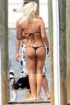 Brooke Hogan walking with most her ass on display in a thong