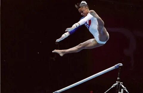 Dominique Dawes on uneven bars at the 1996 Olympics Usa gymn